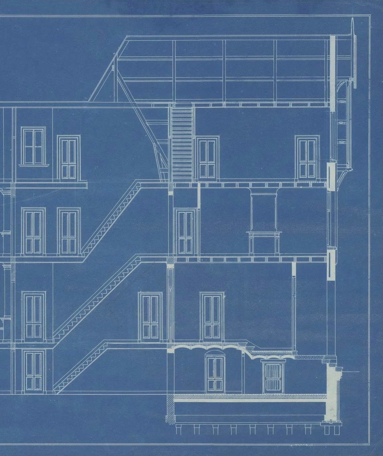 A detailed architectural blueprint laid out flat.